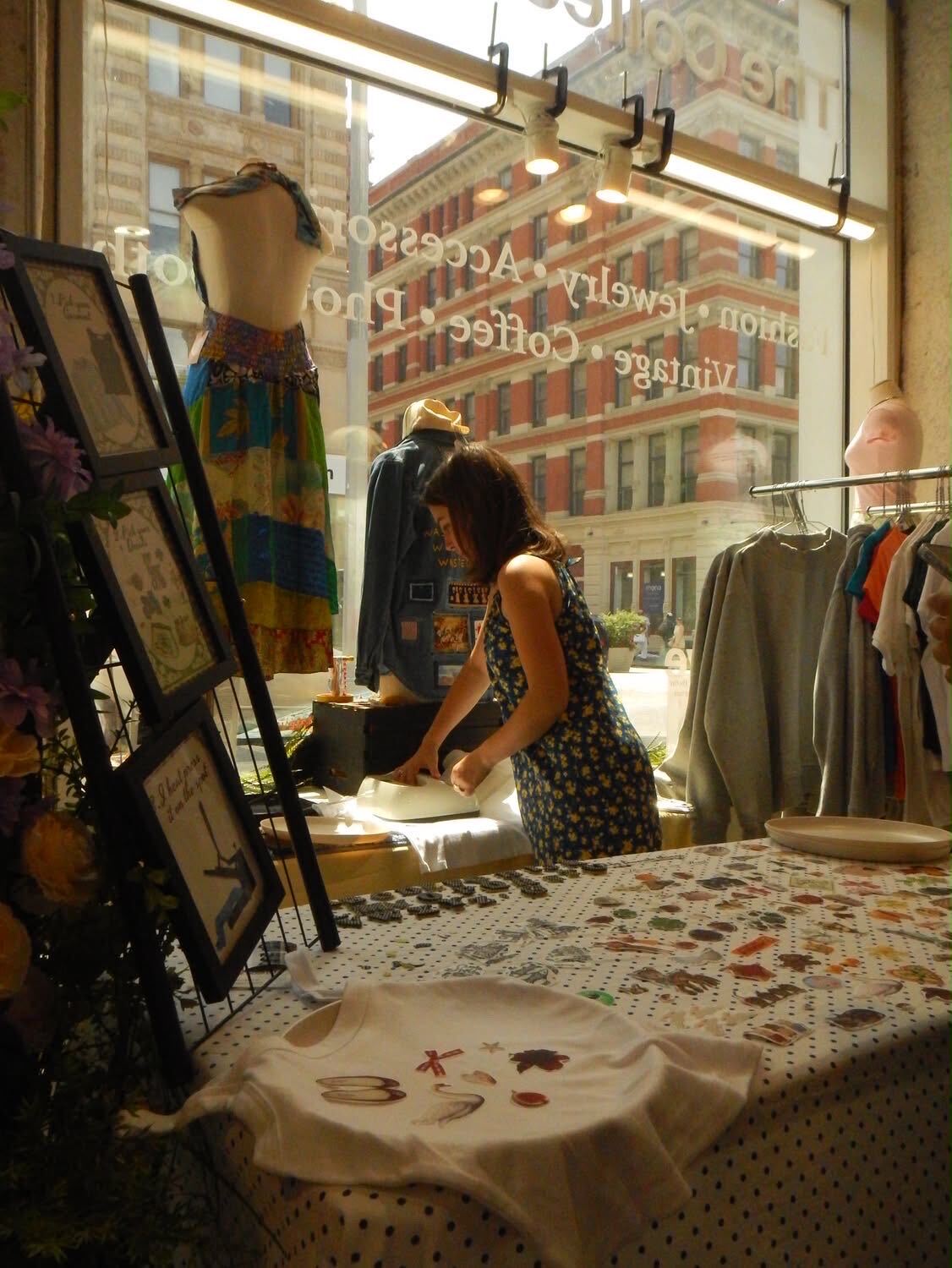 Lola at work in the Teenage Grandma's Closet shop window in Soho, New York